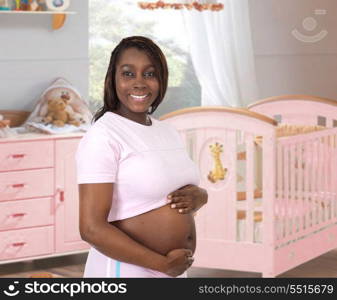 Pregnant woman in the room of her daughter