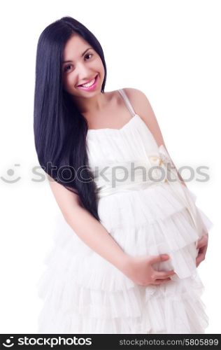 Pregnant woman in wedding dress on white