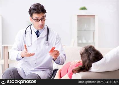Pregnant woman patient visiting doctor for regular check-up