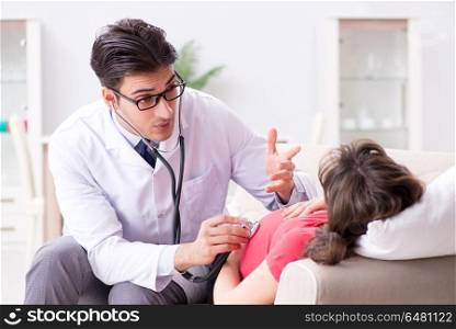 Pregnant woman patient visiting doctor for regular check-up