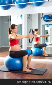 pregnant woman pilates exercise magic ring with fitball