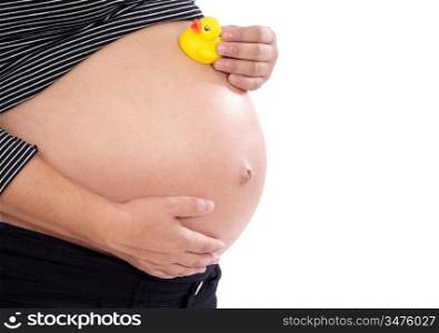 Pregnant woman playing with spotted toy duck