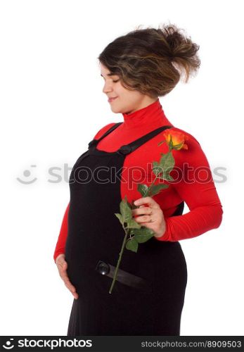 Pregnant woman posing holding rose isolated on white