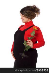 Pregnant woman posing holding rose isolated on white