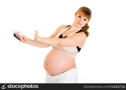 Pregnant woman saying no to tablets isolated on white background&#xA;