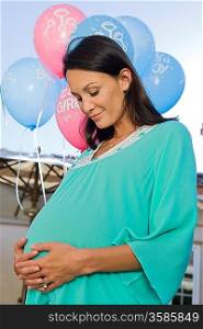 Pregnant Woman standing outside at a Baby Shower