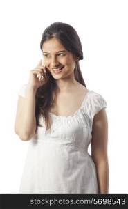 Pregnant woman talking on the mobile phone