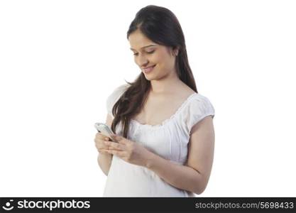 Pregnant woman using her mobile phone