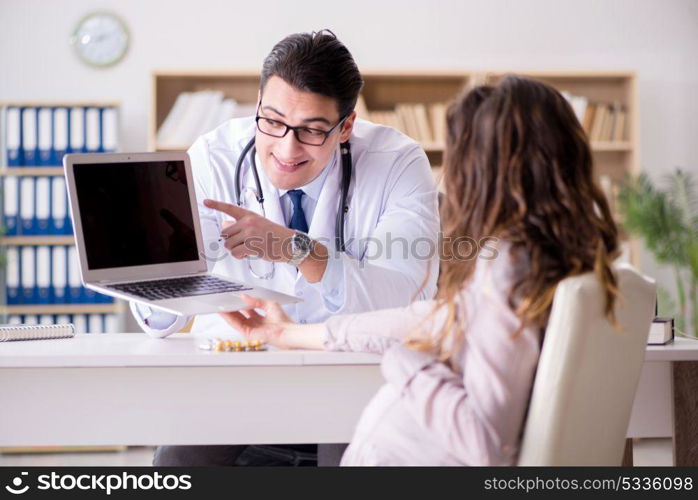 Pregnant woman visiting doctor for consultation