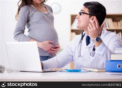 Pregnant woman visiting doctor for consultation