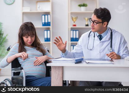 Pregnant woman visiting doctor for consultation