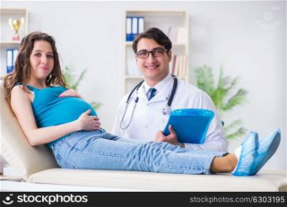 Pregnant woman visiting doctor in medical concept