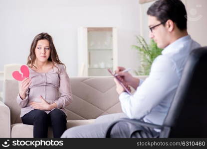 Pregnant woman visiting psychologist doctor