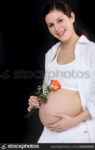 Pregnant woman wearing pink