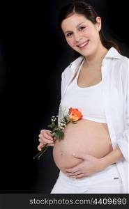 Pregnant woman wearing pink
