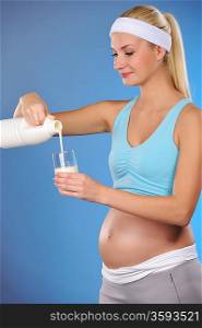 Pregnant woman with a milk