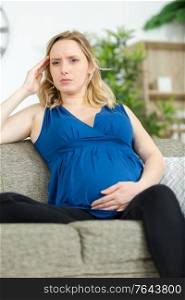 pregnant woman with belly ache