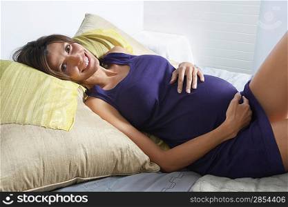 Pregnant Woman with Hands on Stomach