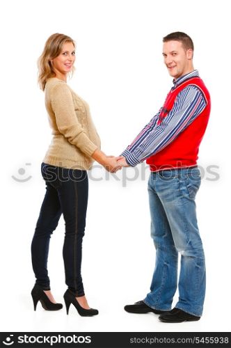 Pregnant woman with husband holding each others hands isolated on white&#xA;