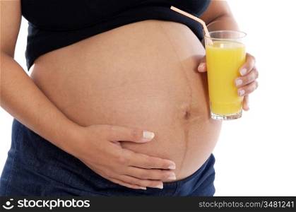 Pregnant woman with juice a over white background