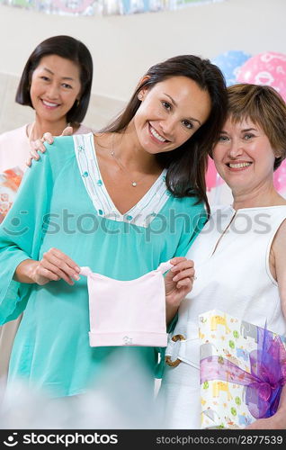 Pregnant Woman with Mature Women at a Baby Shower
