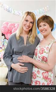Pregnant Woman with Mother at a Baby Shower