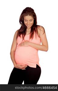 Pregnant woman with pink t-shirt isolated on a white background