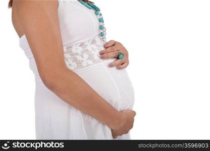 pregnant young woman isolated on a white
