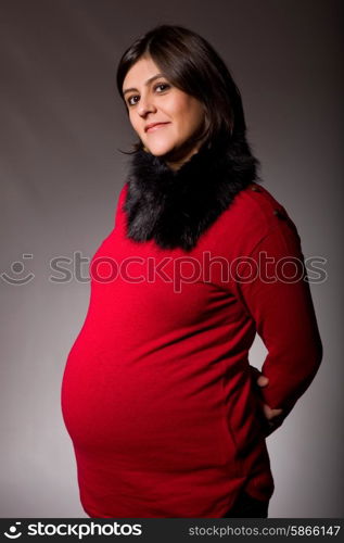 pregnant young woman studio picture