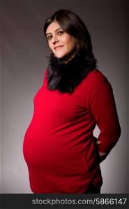 pregnant young woman studio picture