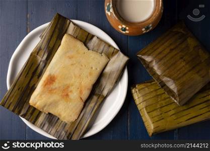 Prehispanic dish typical of Mexico and some Latin American countries. Corn dough wrapped in banana leaves. The tamales are steamed.