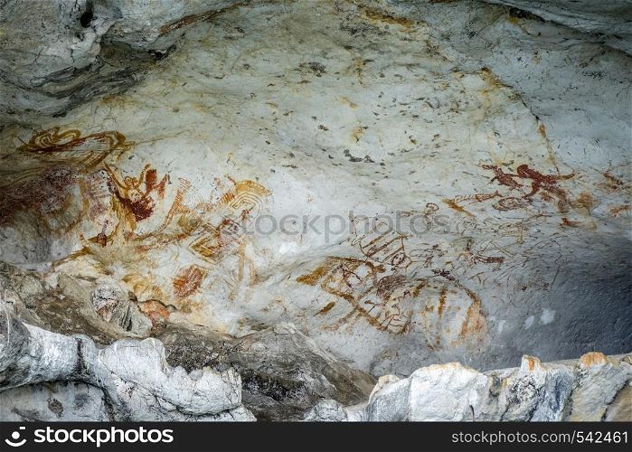 Prehistoric paintings on a cave wall, Phang Nga Bay, Thailand. Prehistoric paintings in a cave, Phang Nga Bay, Thailand