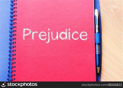Prejudice text concept write on notebook with pen