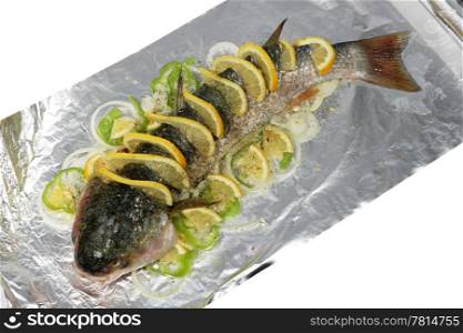 Preparation of baked fish on the white background