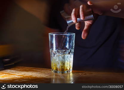 Preparation of long cocktails. Close-up