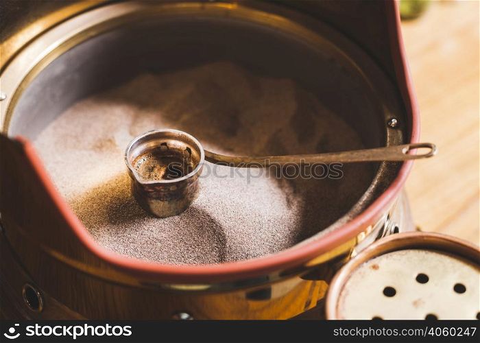 preparation turkish coffee cezve sand cafe bar