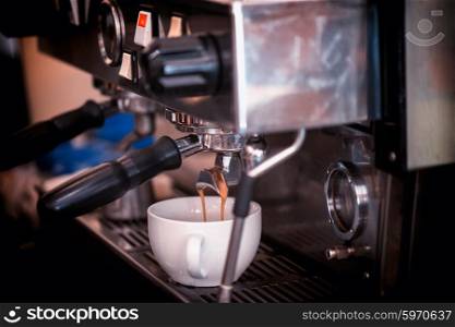 preparing coffee in cafe. preparing coffee in coffee shop with professional coffee machine