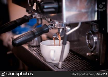 preparing coffee in cafe. preparing coffee in coffee shop with professional coffee machine