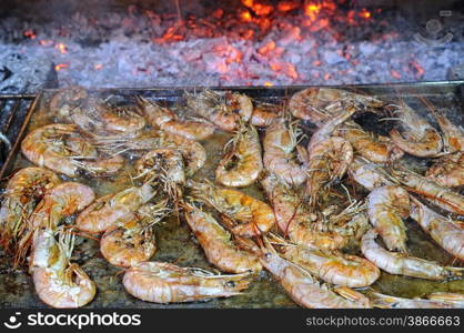 Preparing delicious prawns grilled in the restaurant&#xA;