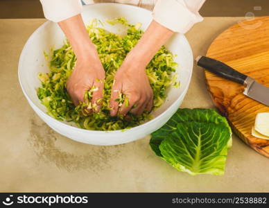 Preparing fermented preserved vegetables. Cabbage kimchi and sauerkraut sour cabbage.