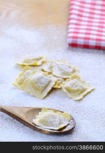 Preparing fresh ravioli at the kitchen table.&#xA;