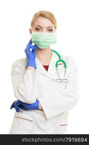 Preparing to surgery, protective equipment concept. Young woman doctor in face surgical mask and medical gloves isolated