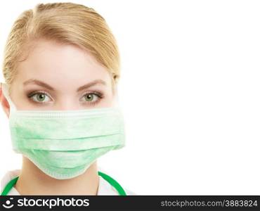 Preparing to surgery, protective equipment concept. Young woman doctor in face surgical mask