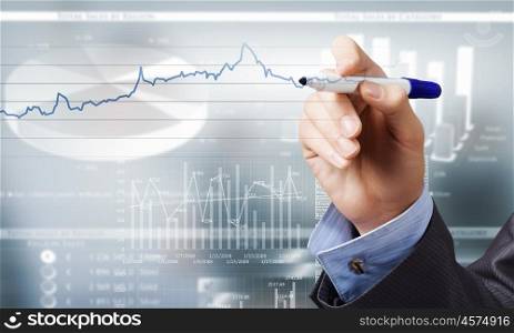Presenting growth strategy. Close up of businessman drawing increasing graph with marker on media screen