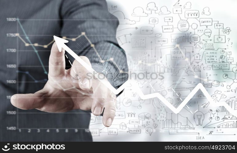 Presenting growth strategy. Close up of businessman touching increasing graph on media screen