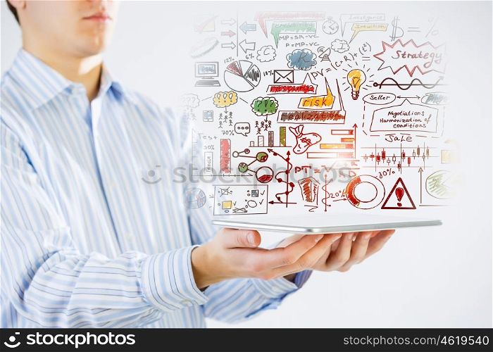 Presenting his business plan. Businessman hands demostrating business strategy plan on tablet screen