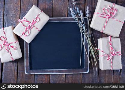 presents and black board on a table