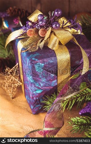 Presents over wooden background for Merry Christmas and Happy New Year
