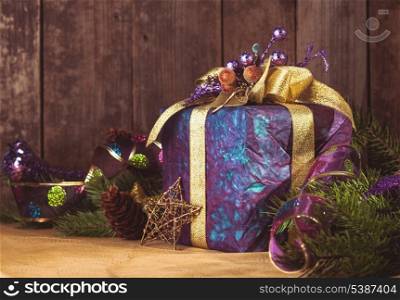 Presents over wooden background for Merry Christmas and Happy New Year