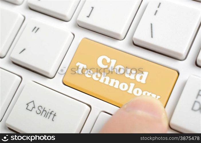 Pressing brown cloud technology key on keyboard